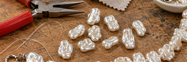 Hilos de perlas planas | Schreier piedras preciosas, piedras curativas y joyería