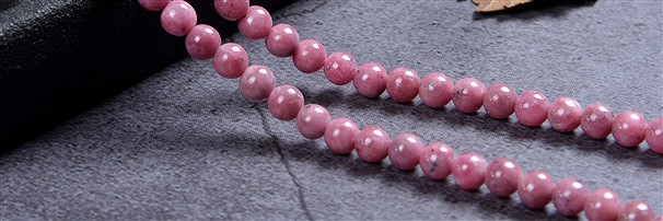 Gemstone strands Rhodonite | minerals wholesale - gems, healing stones & jewelry