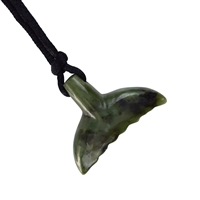 Maori pendant whale fin with garnish in pouch