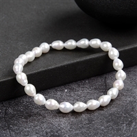 Bracelet, perle (blanche), 06 - 07mm tropiques