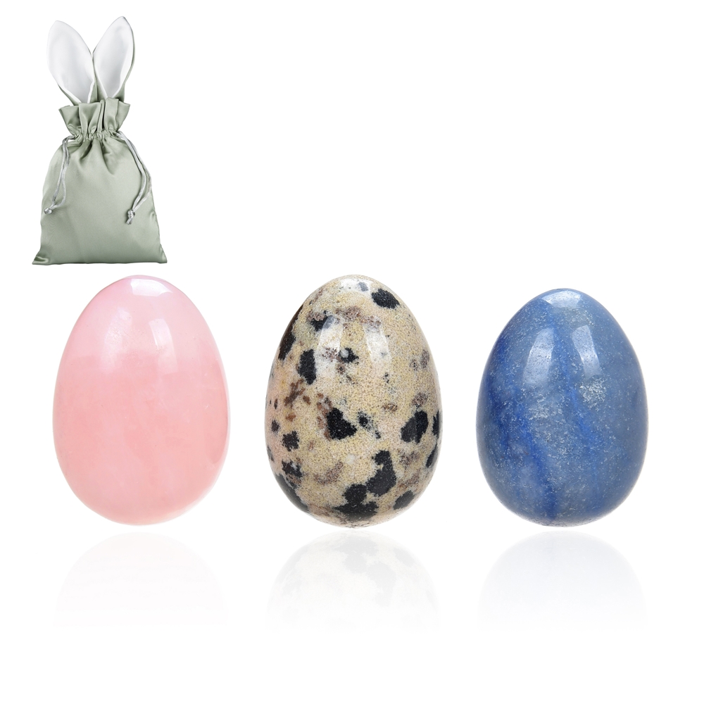 Huevos de Pascua (Cuarzo rosa, piedra Dalamatiner, cuarzo azul en una bolsa de conejo)