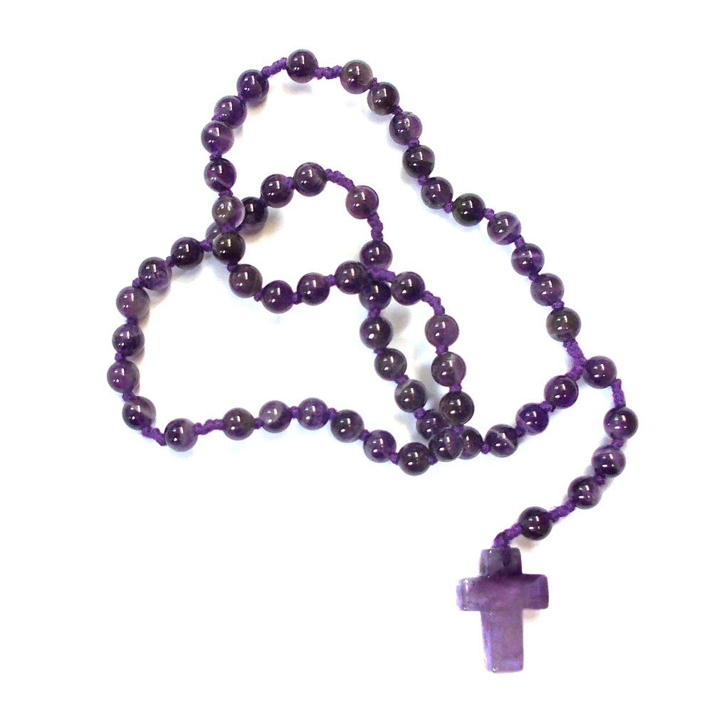 Rosary amethyst in pressure lock case with explanation in four languages