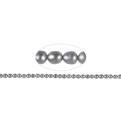 141840405254 Strand of rice grain, freshwater pearl A, silver-grey (dyed), 05-06mm | Marco Schreier