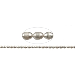 141840406042 Strand of rice grain, freshwater pearl AB, white-cream, 08 x 06-07mm | Marco Schreier