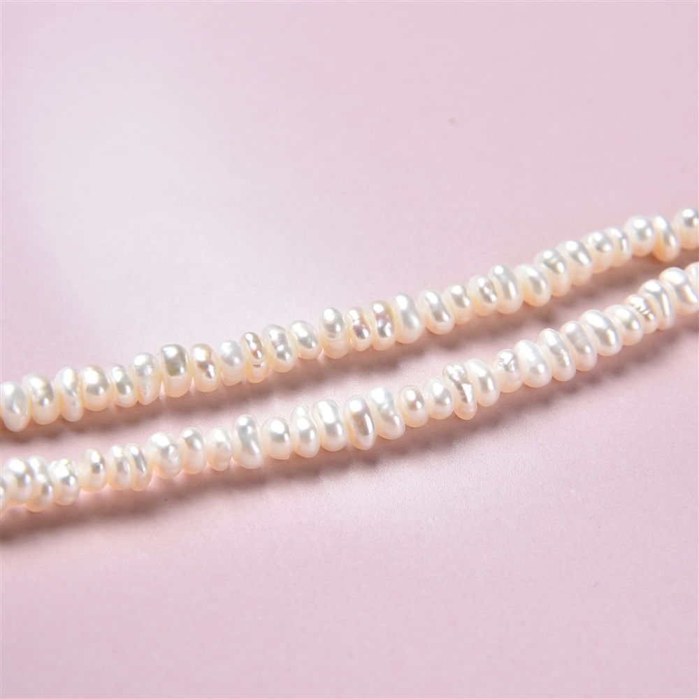 Button strand, freshwater pearl AB, white, 02-03 x 03-04mm | Marco Schreier