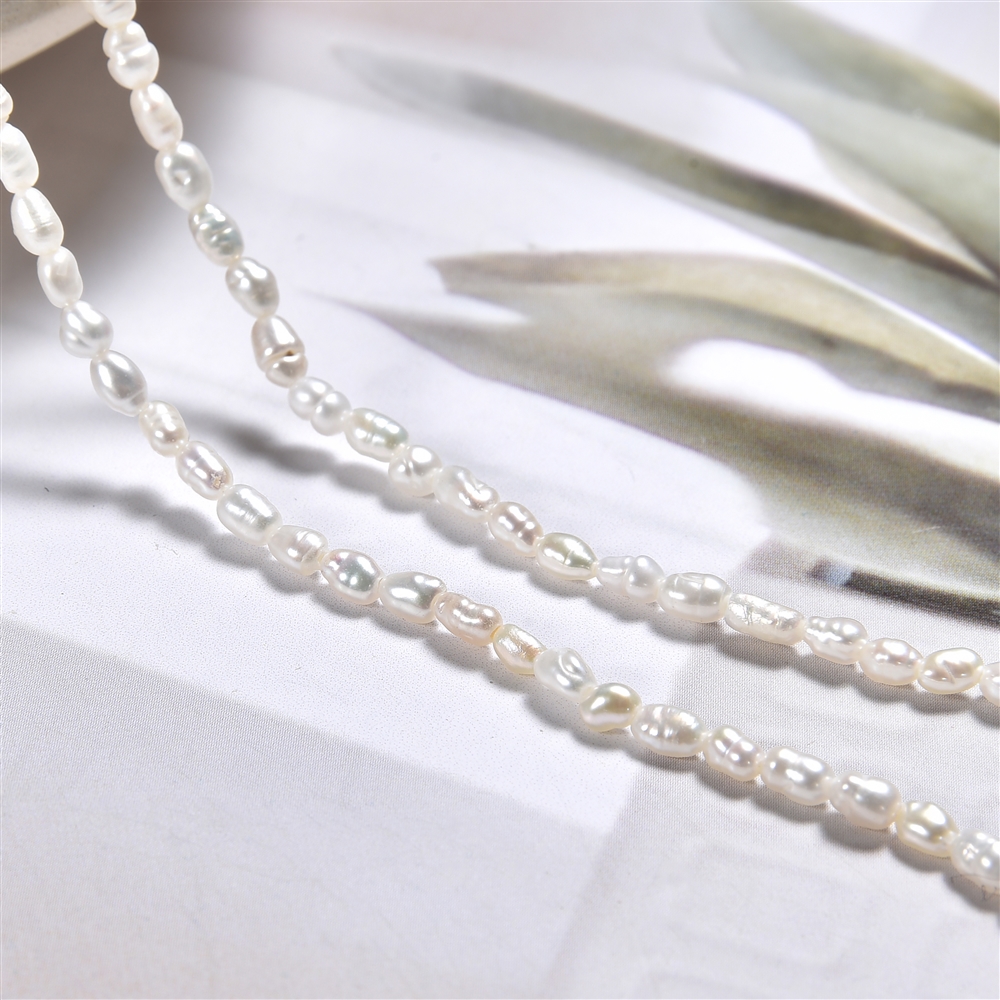 Keshi strand, freshwater pearl AB, cream-white, 09 - 12mm (39cm) | Marco Schreier