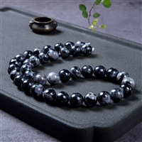 Strand of beads, Gabbro (Mystic Merlinite), 10mm
